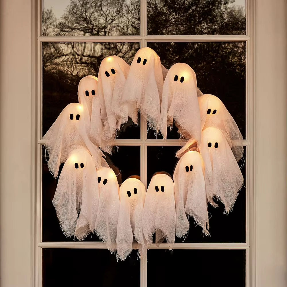 Get Spooked with Our Glowing Ghost Wreath: The Ultimate Halloween Door Decor for Frightening Fun!